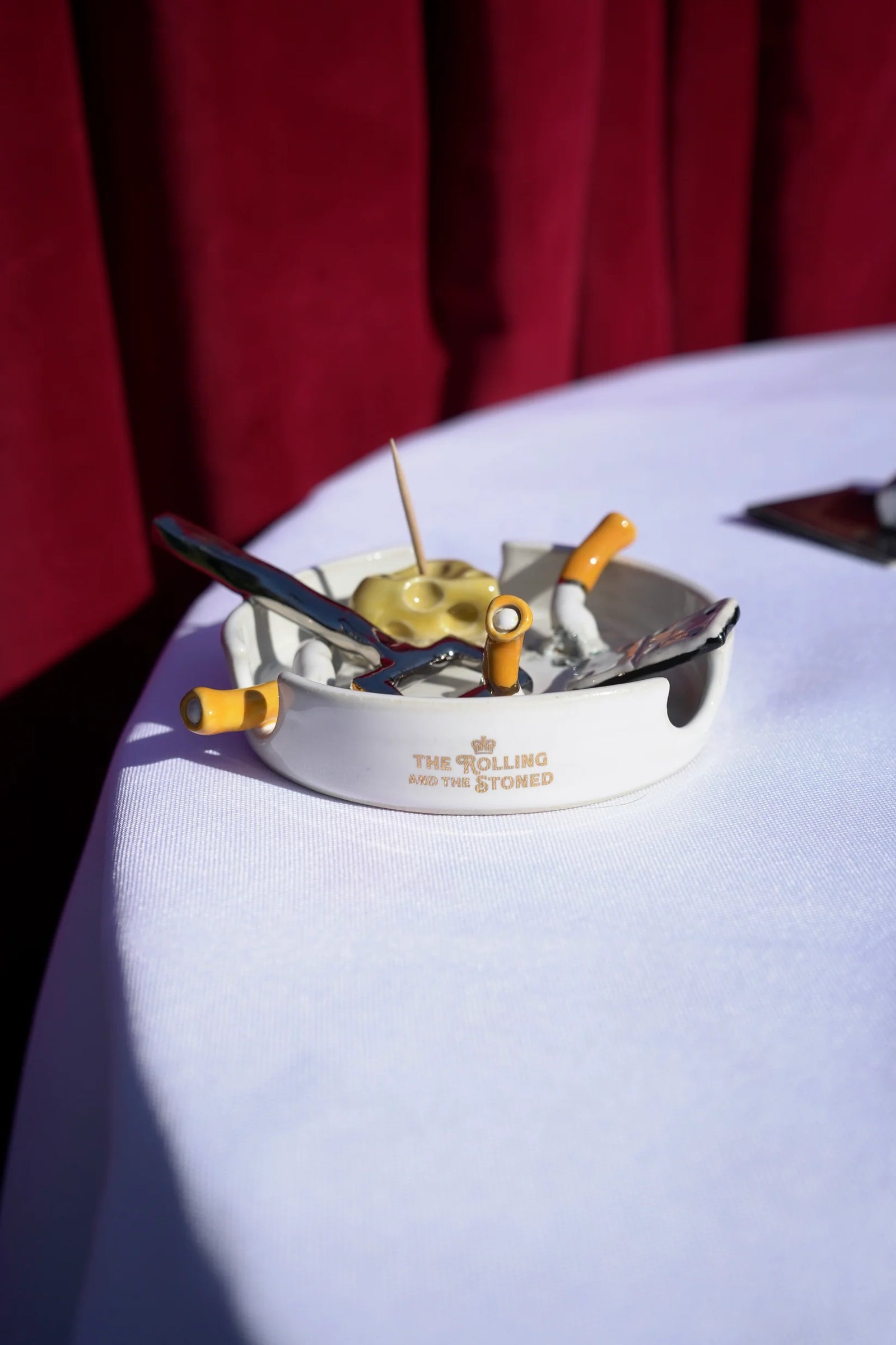 The Bottle Opener and Domino Ashtray